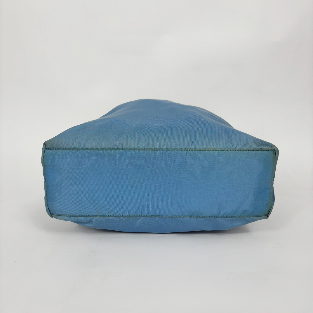 Blue bean bag chair on a white background