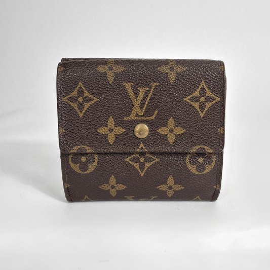 Louis Vuitton wallet with monogram pattern on a white background