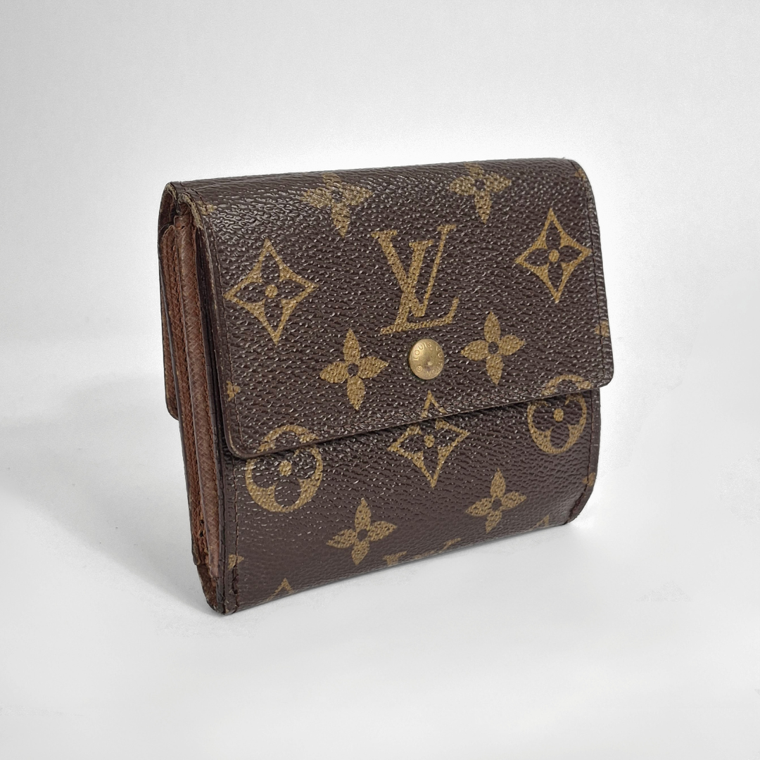 Louis Vuitton wallet with monogram pattern on a white background