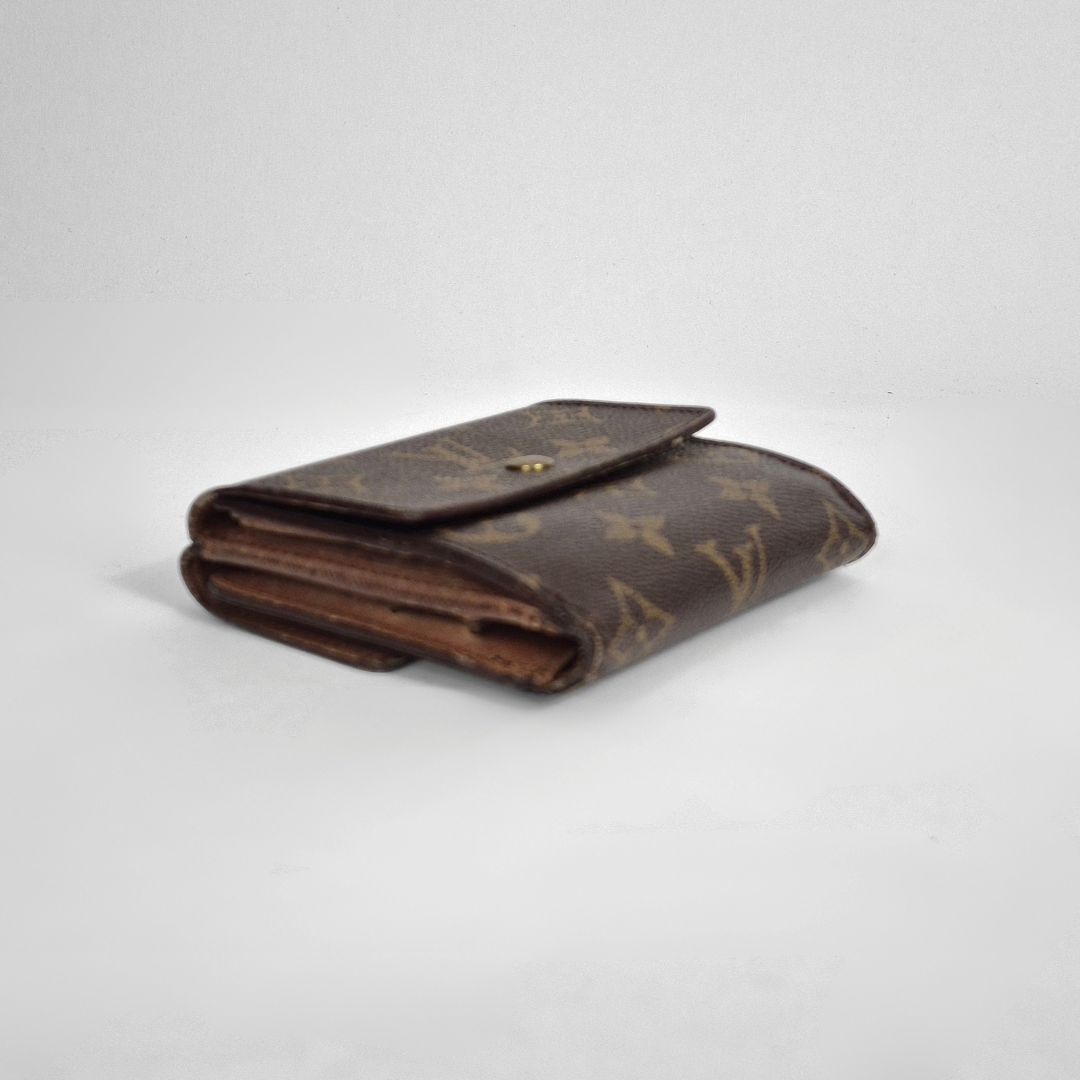 Folded brown wallet with monogram pattern on a light gray background
