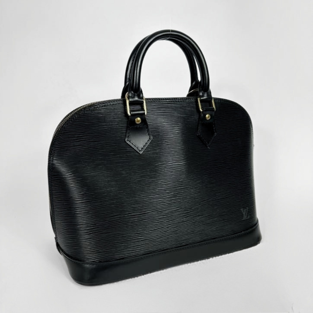 Louis Vuitton Alma in Black Epi Leather on a white