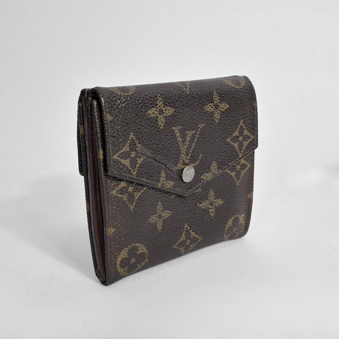 Louis Vuitton wallet with monogram pattern on a white background