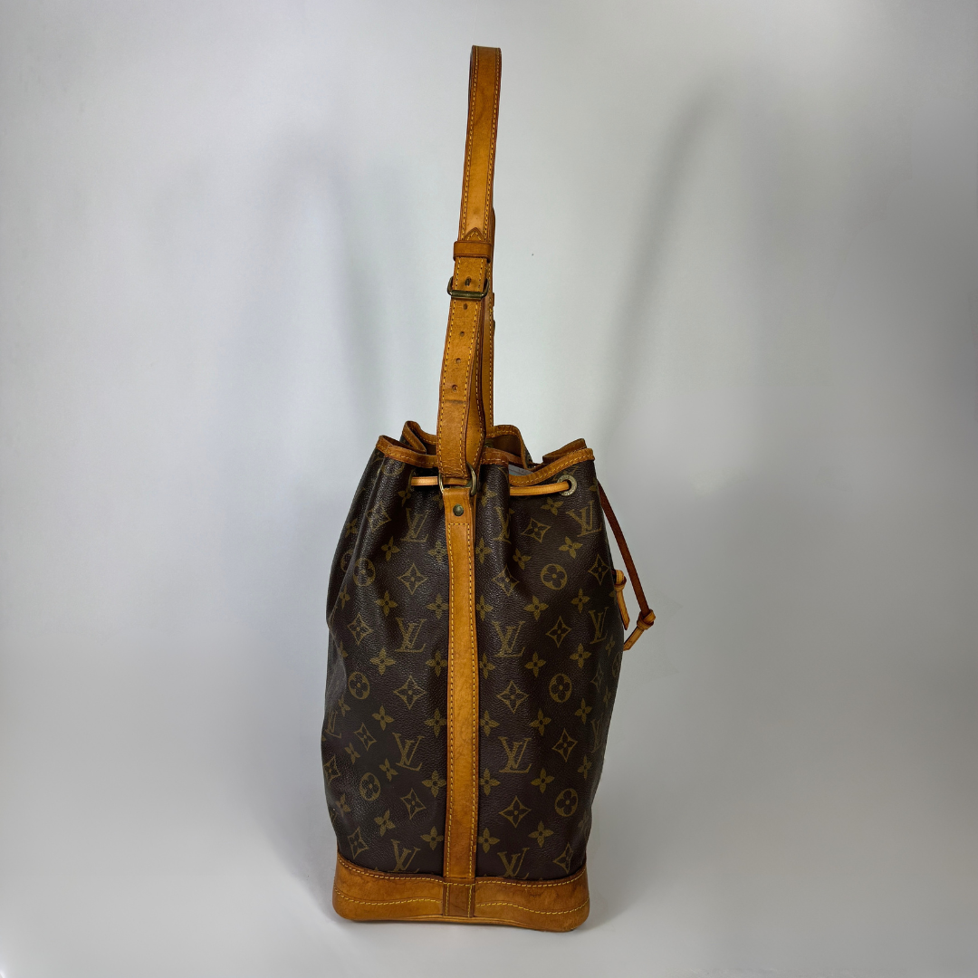 Louis Vuitton Petit Noe Monogram Canvas on a white background