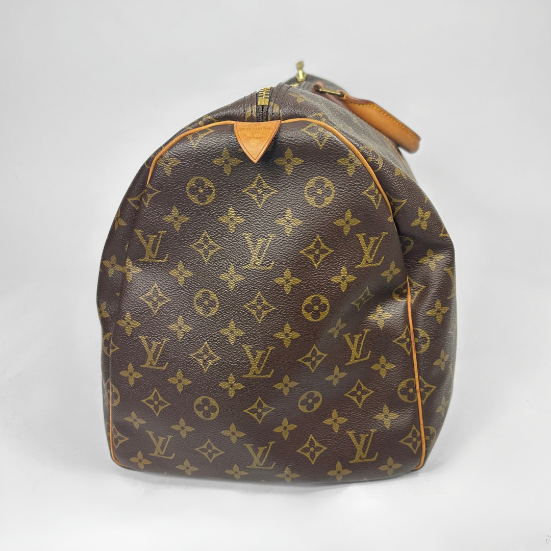 Louis Vuitton Keepall 55 on a white background