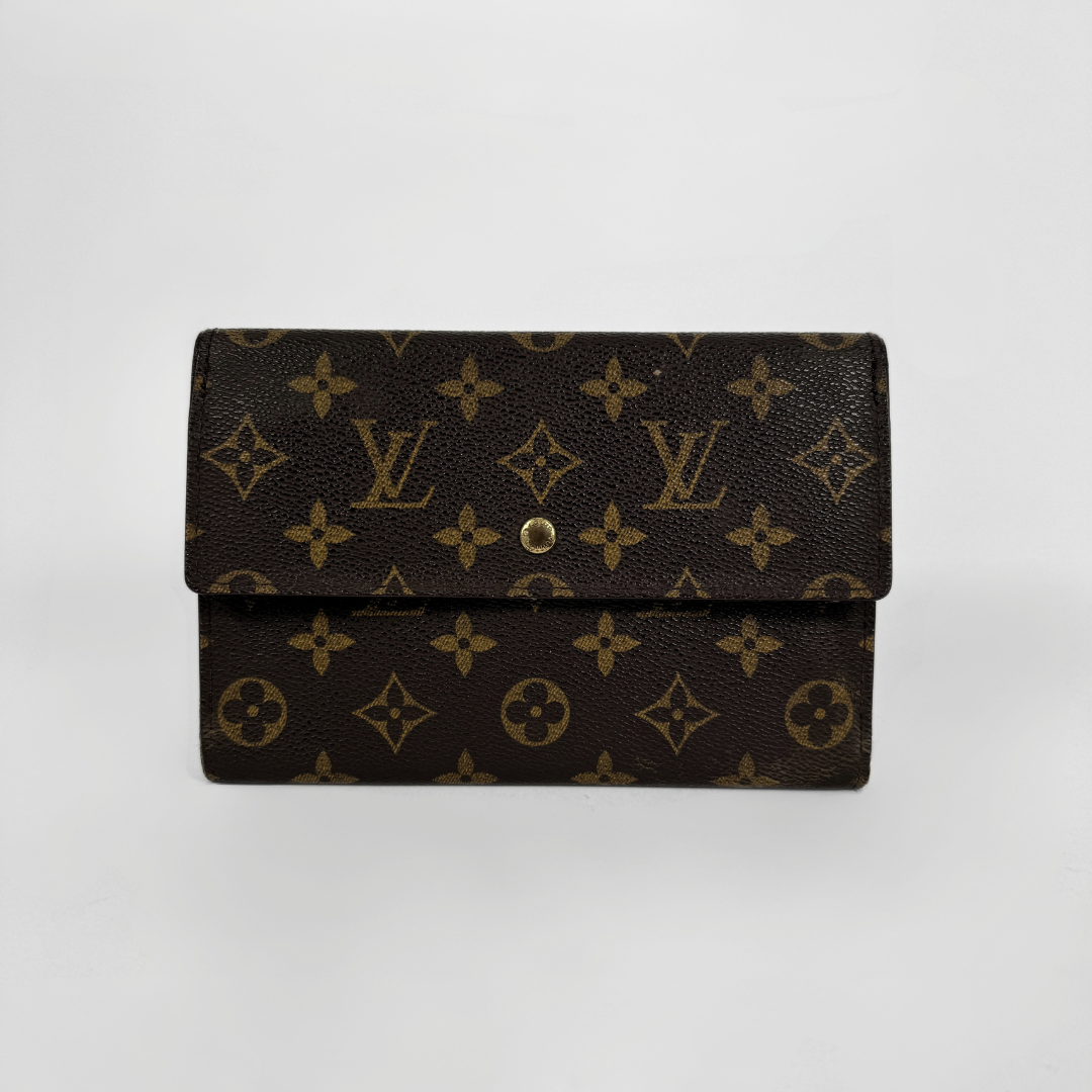 Louis Vuitton Wallet in front of white background