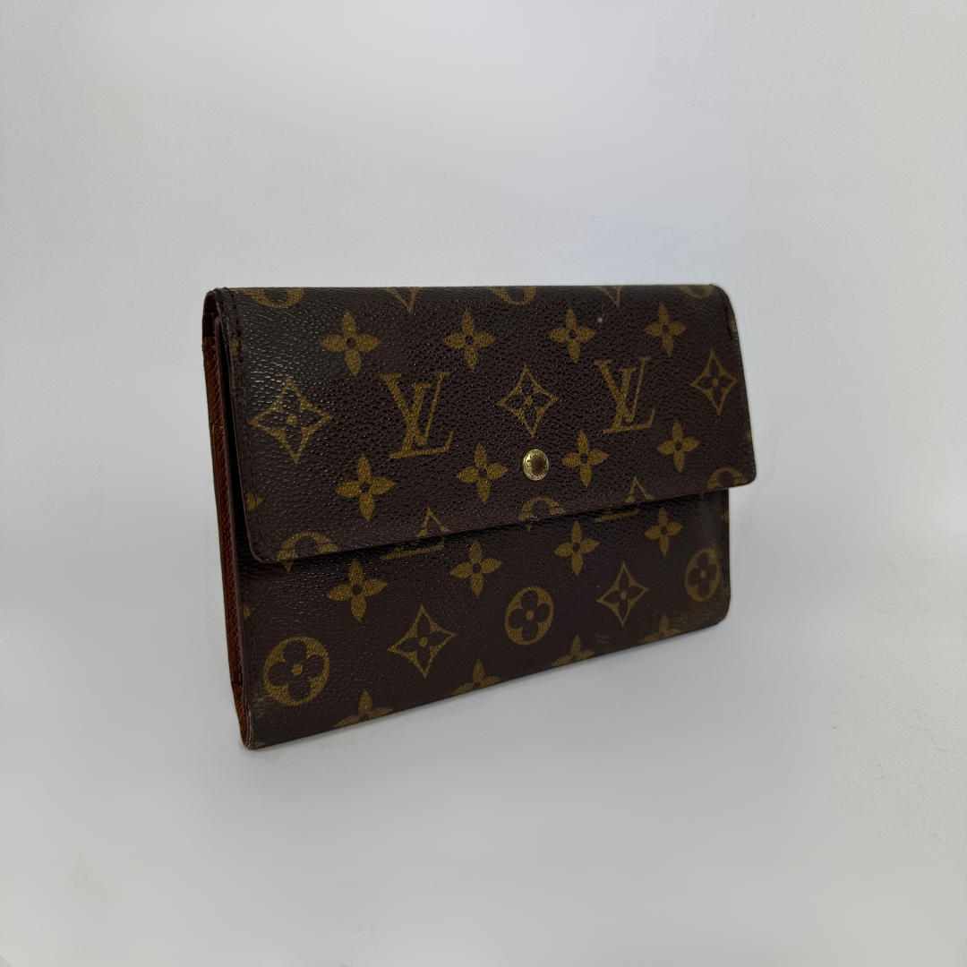 Louis Vuitton Wallet in front of white background
