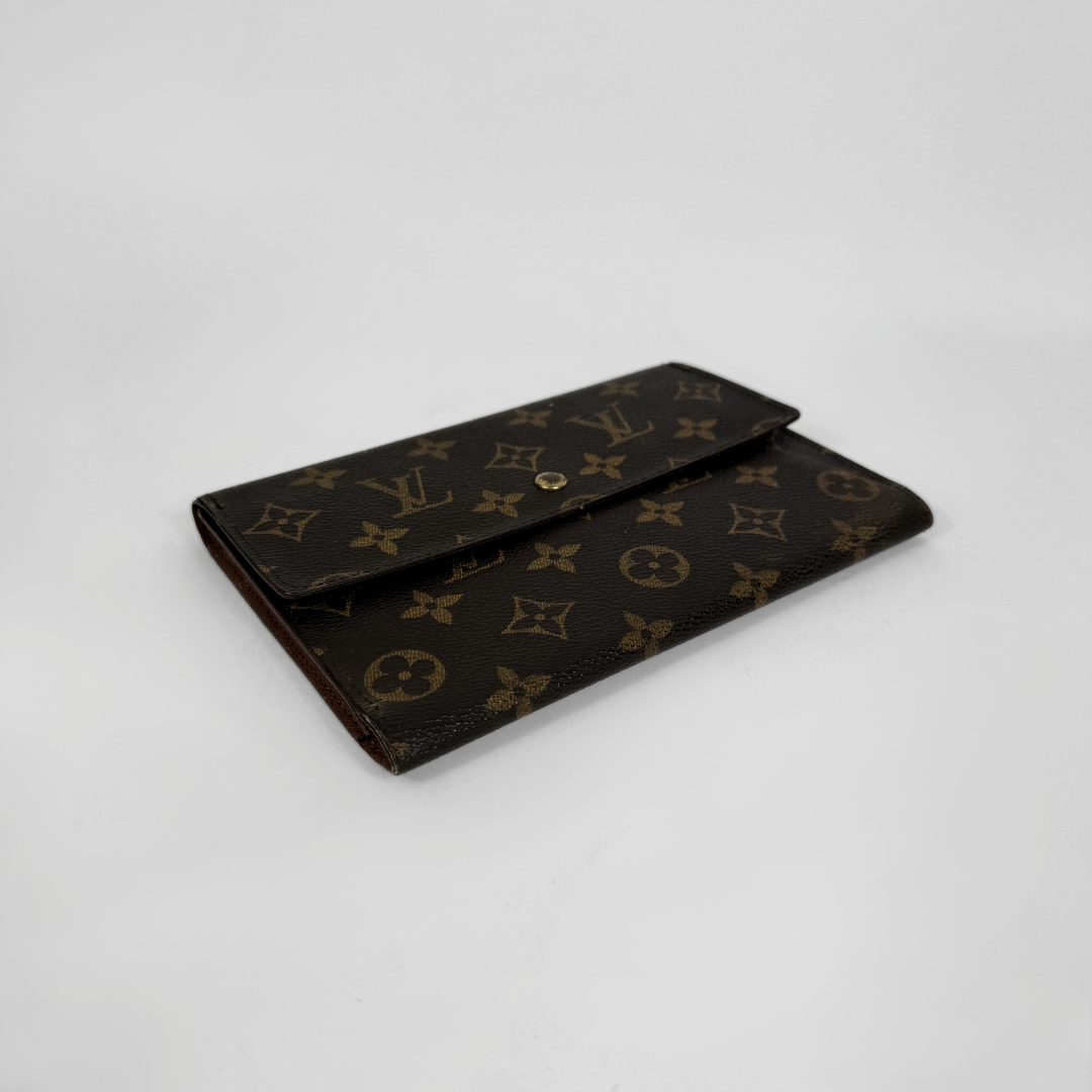 Louis Vuitton Wallet in front of white background