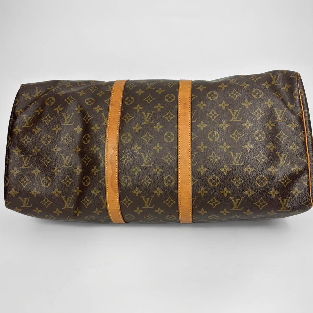 Louis Vuitton Keepall 55 on a white background