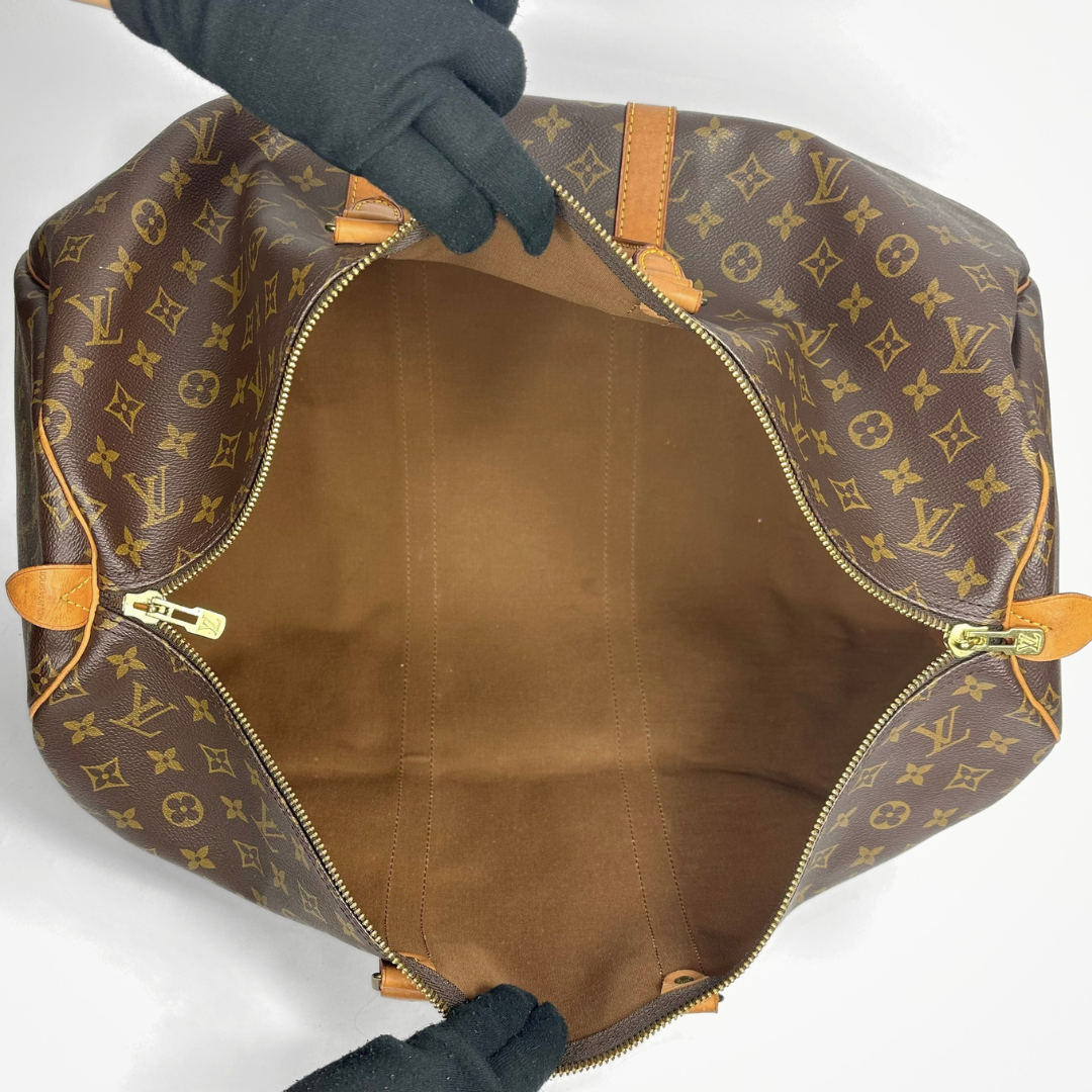 Louis Vuitton Keepall 55 on a white background