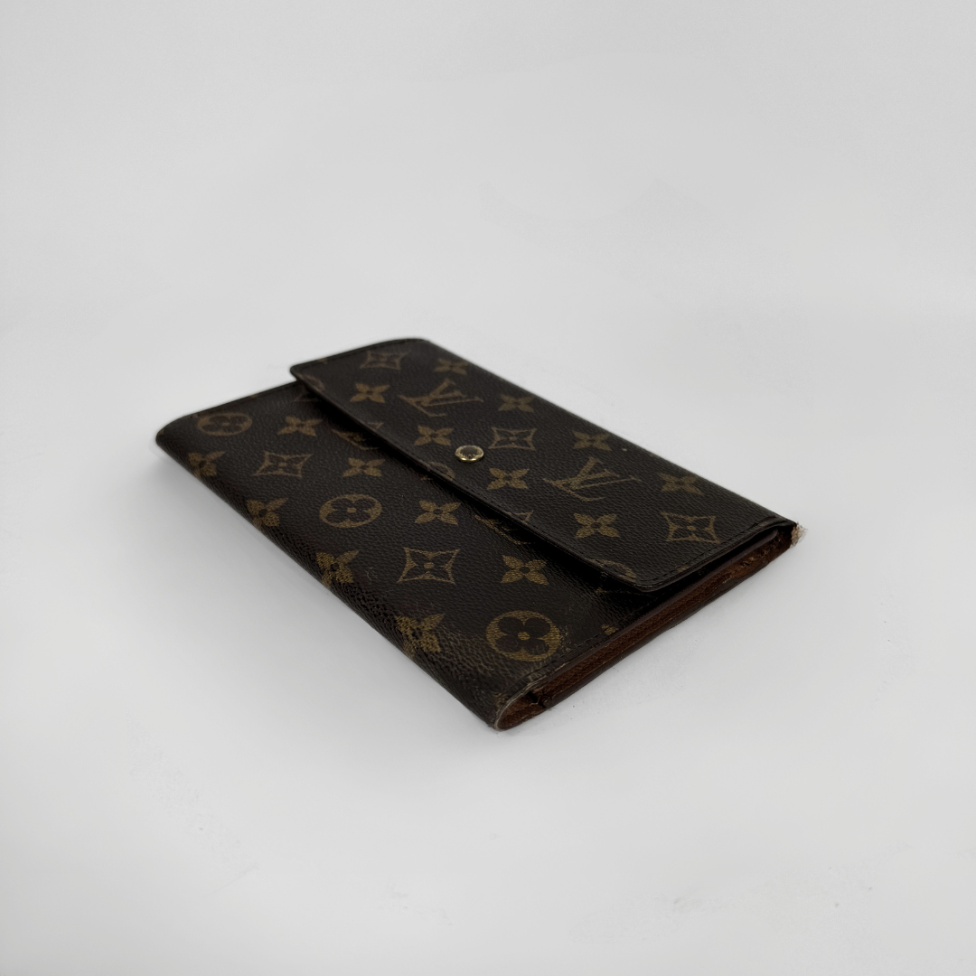 Louis Vuitton Wallet in front of white background