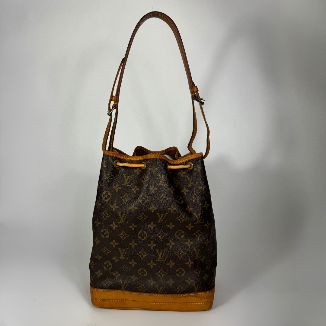 Louis Vuitton Petit Noe Monogram Canvas on a white background