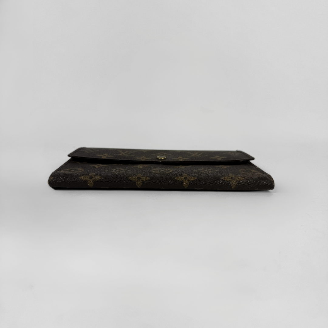 Louis Vuitton Wallet in front of white background