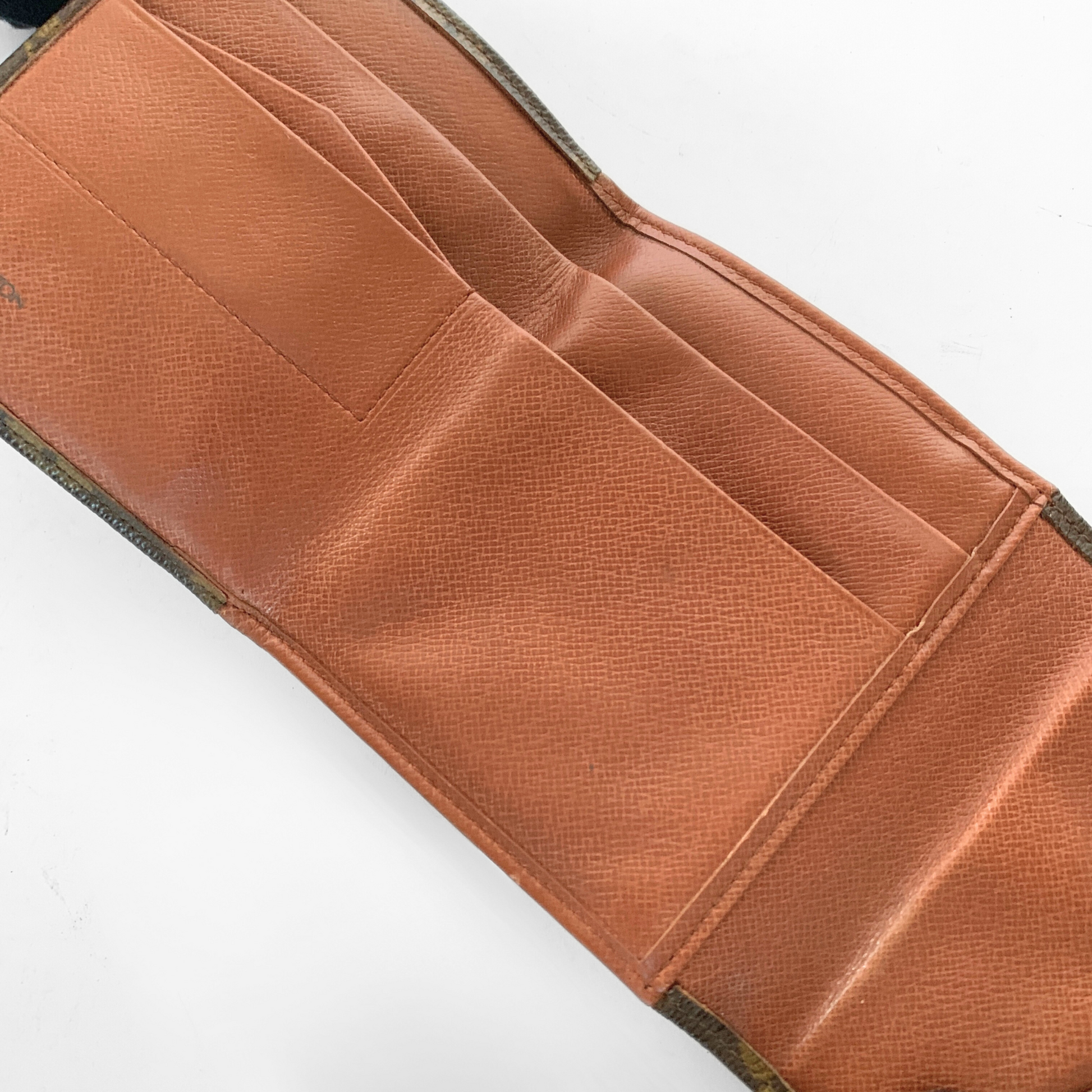 Brown leather wallet on a white background