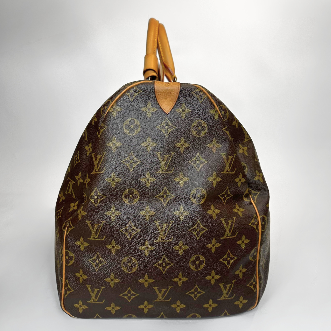 Brown Louis Vuitton bag with monogram pattern on a white background
