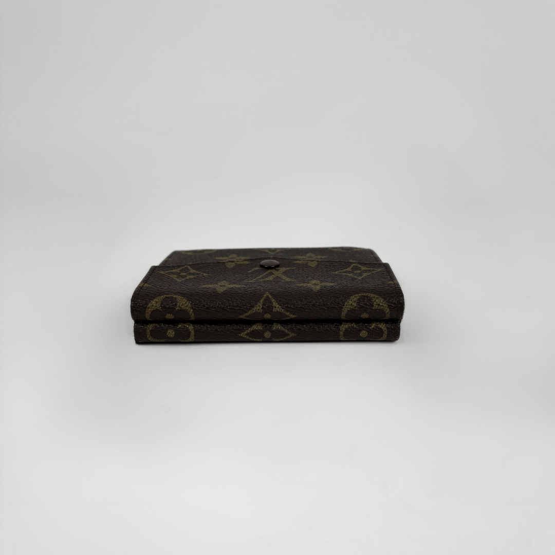 Louis Vuitton Druk Wallet on a white background