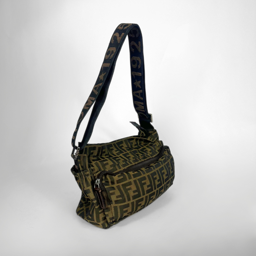 Patterned handbag with a visible brand logo on a white background