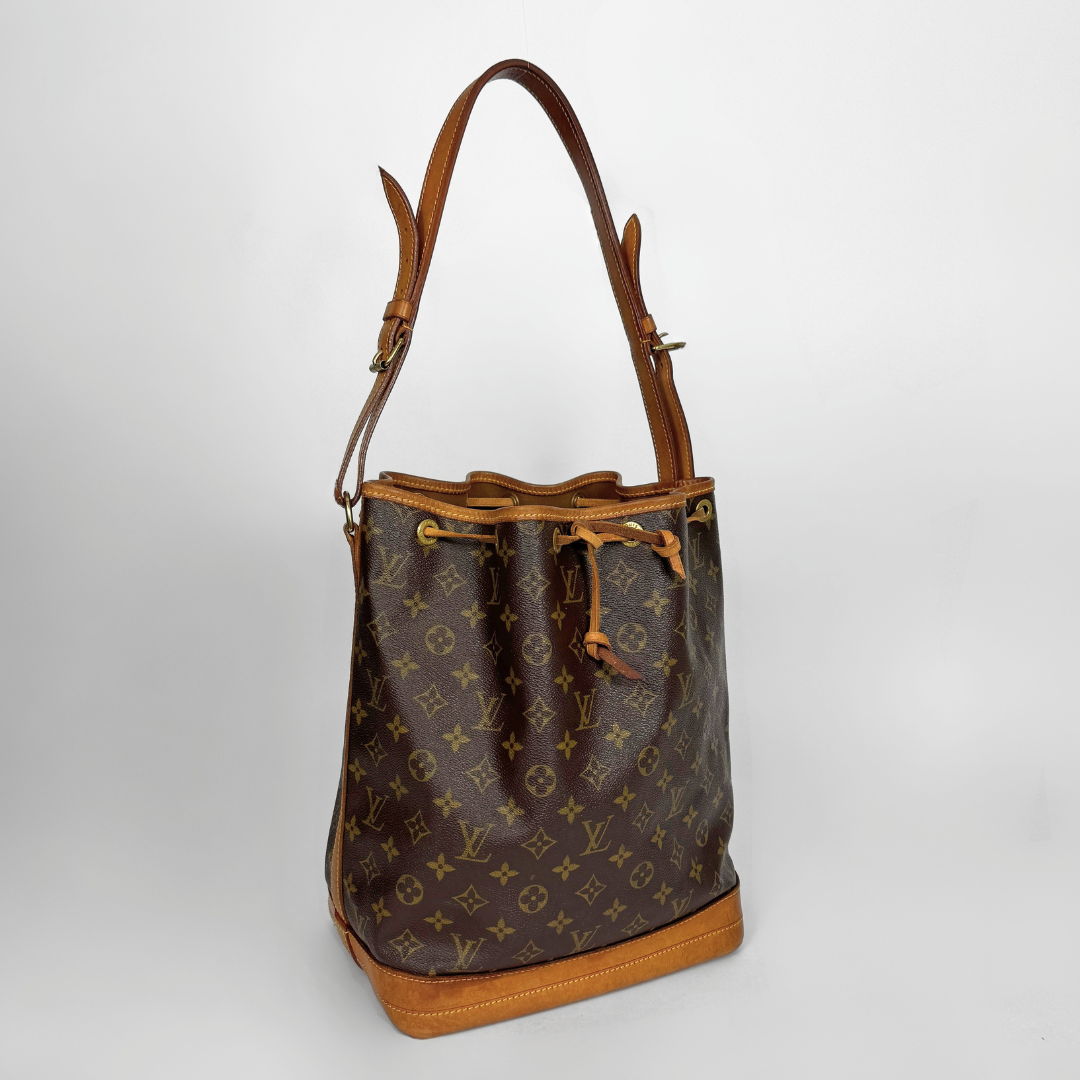 Louis Vuitton Petit Noe Monogram Canvas on a white background