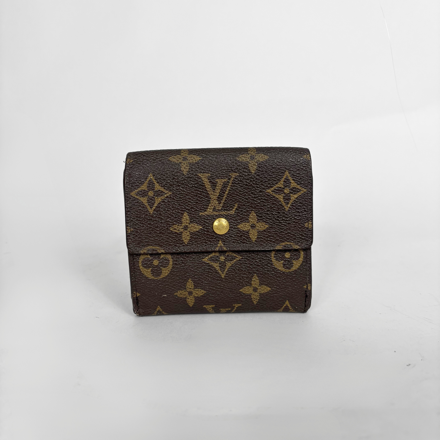 Brown wallet with gold monogram pattern on a white background
