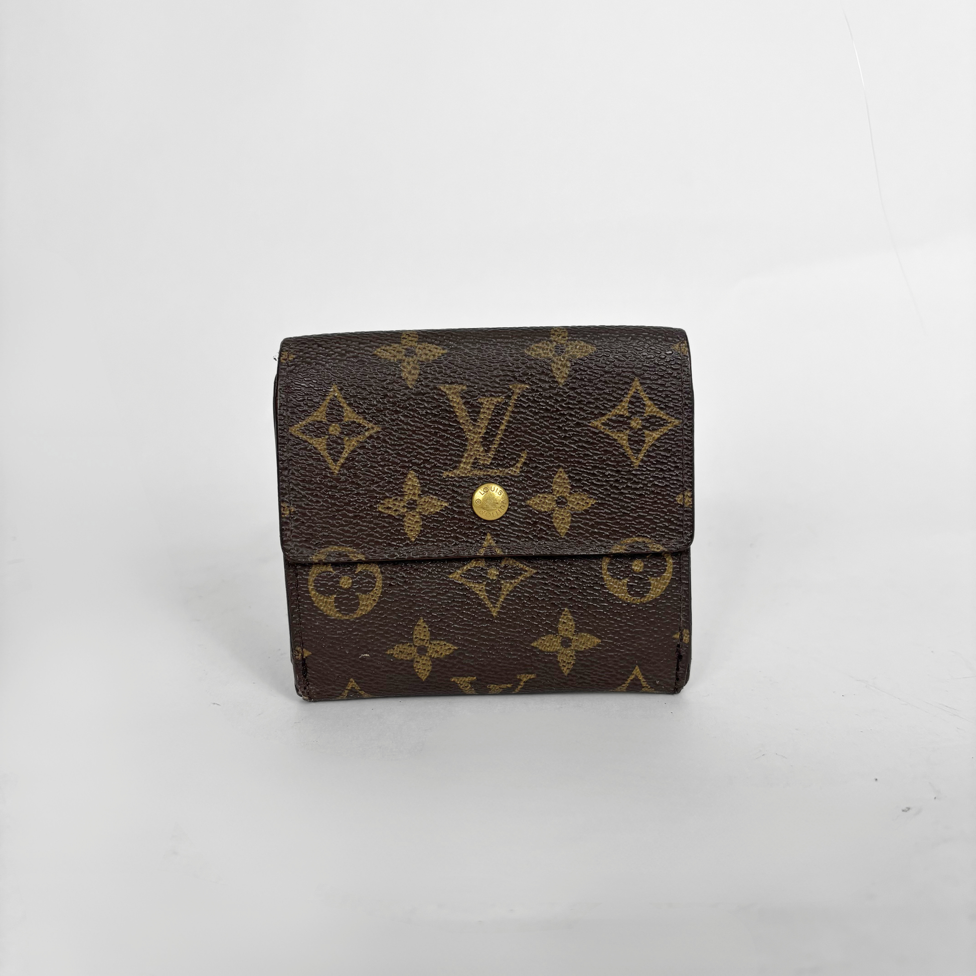 Brown wallet with gold monogram pattern on a white background
