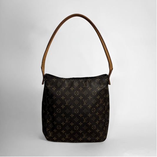 Louis Vuitton monogram canvas shoulder bag with a brown leather shoulder strap, shown against a light gray background.
