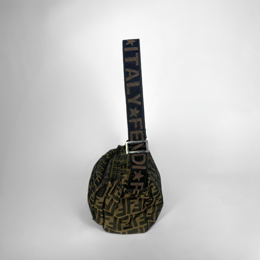 Patterned bag with a strap on a white background