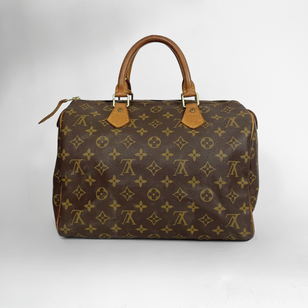 Louis Vuitton Speedy 30 in a white background. 