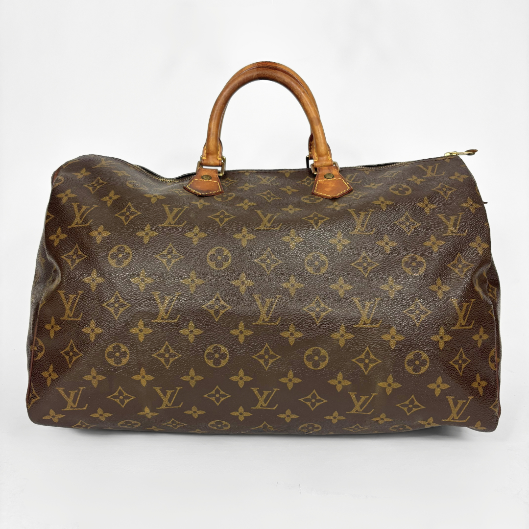 Brown Louis Vuitton bag with monogram pattern on a white background