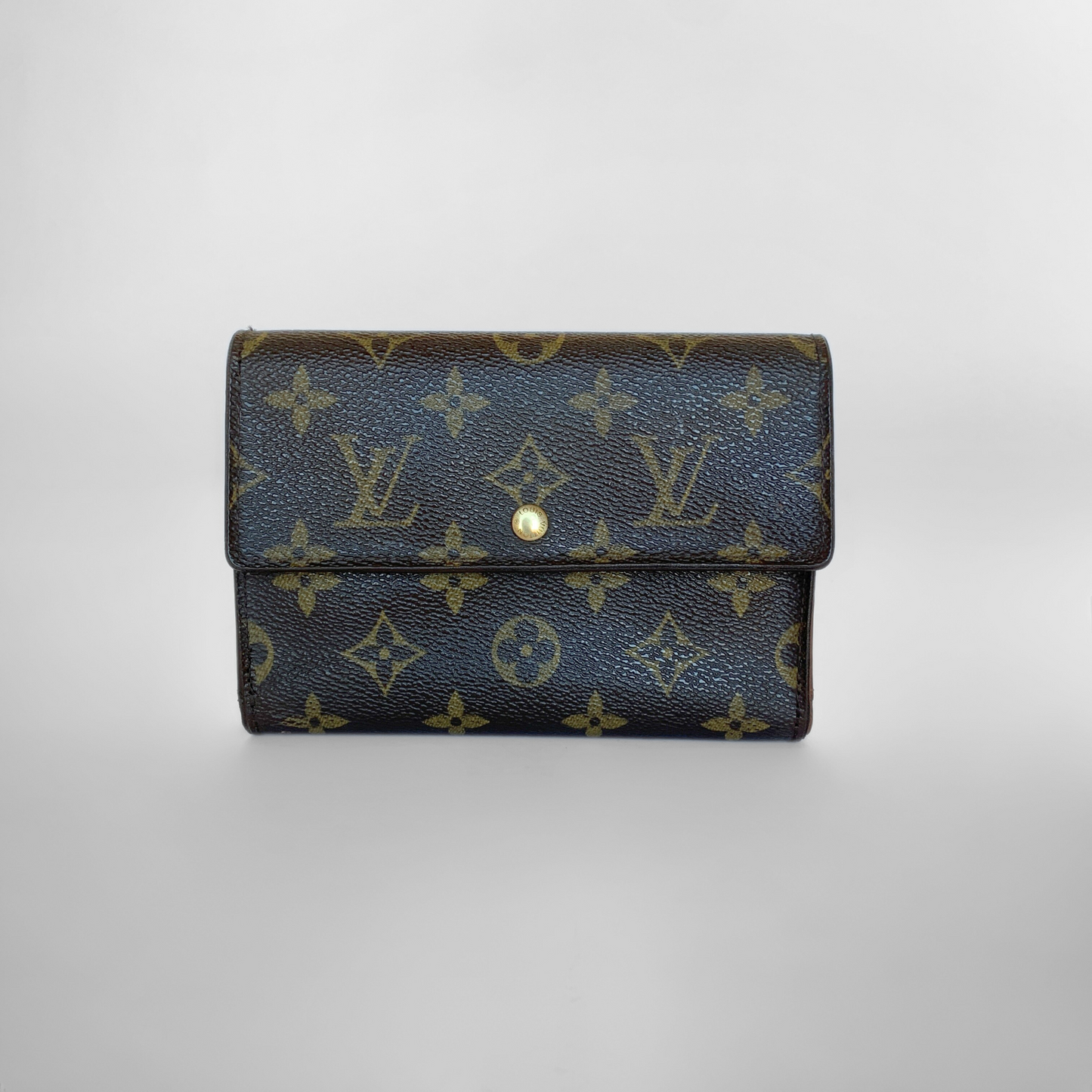 Louis Vuitton International Wallet Medium on a white background