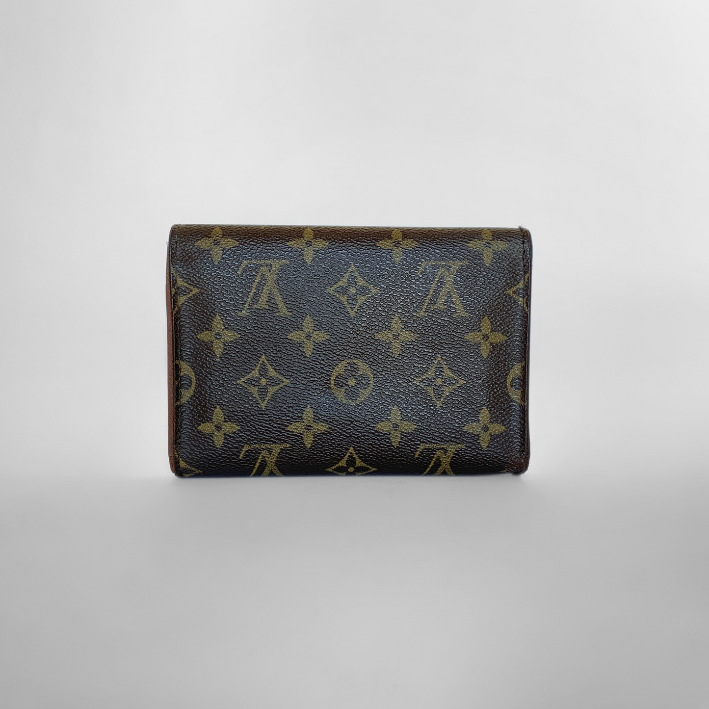 Louis Vuitton International Wallet Medium on a white background
