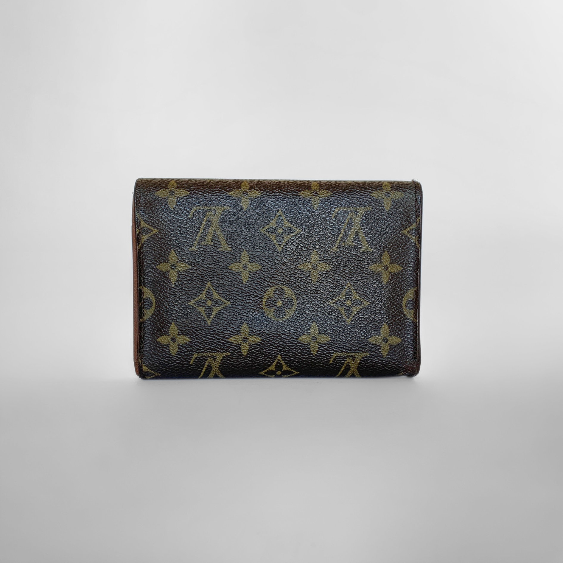 Louis Vuitton International Wallet Medium on a white background