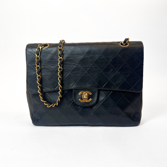 Chanel Classic Flap Bag Medium on a white background
