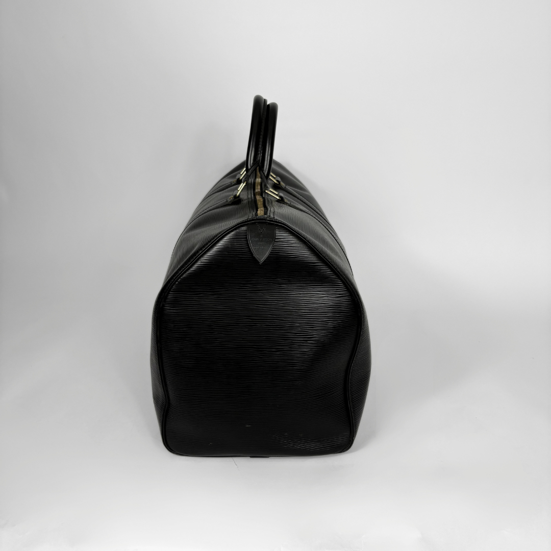 Black handbag on a white background