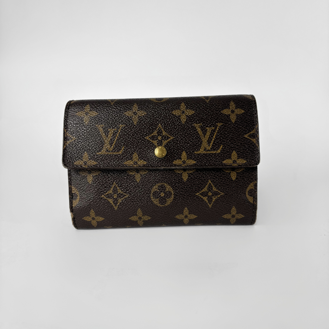 Louis Vuitton International Wallet Medium on a white background