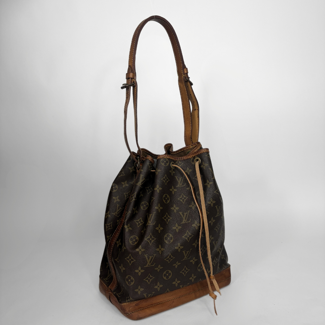 Louis Vuitton Petit Noe Monogram Canvas on a white background
