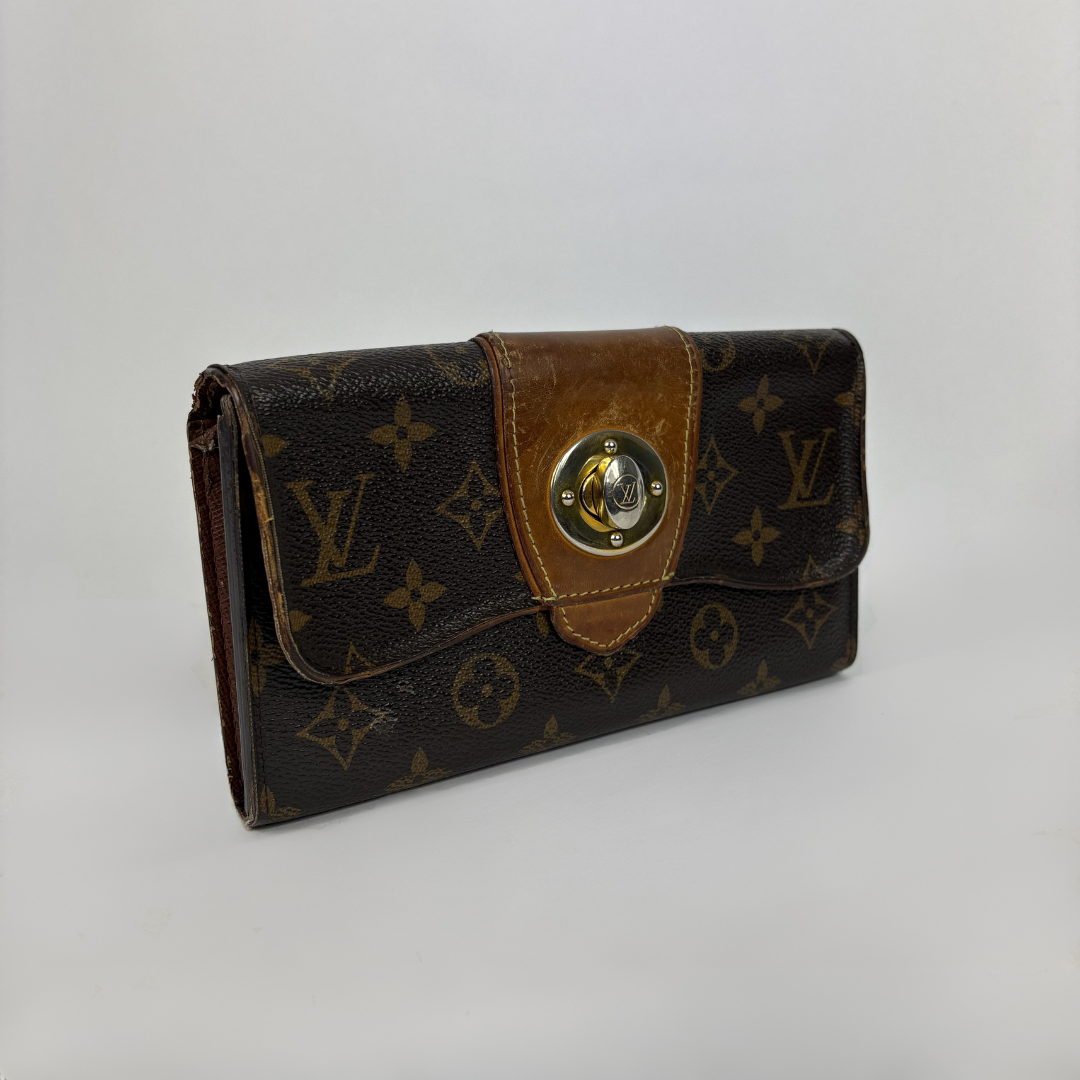 Louis Vuitton Wallet in front of white background