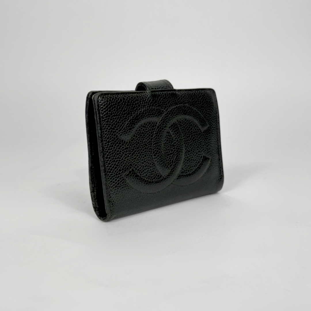 Black leather wallet with brand logo on a light gray background