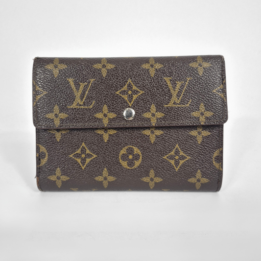 Louis Vuitton wallet with monogram pattern on a white background