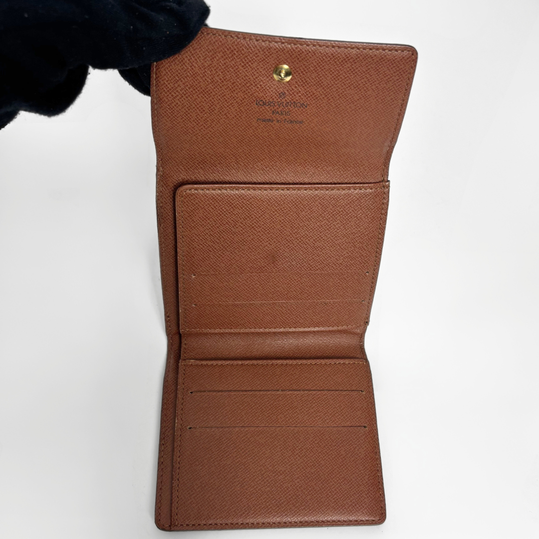Brown leather wallet on a white background
