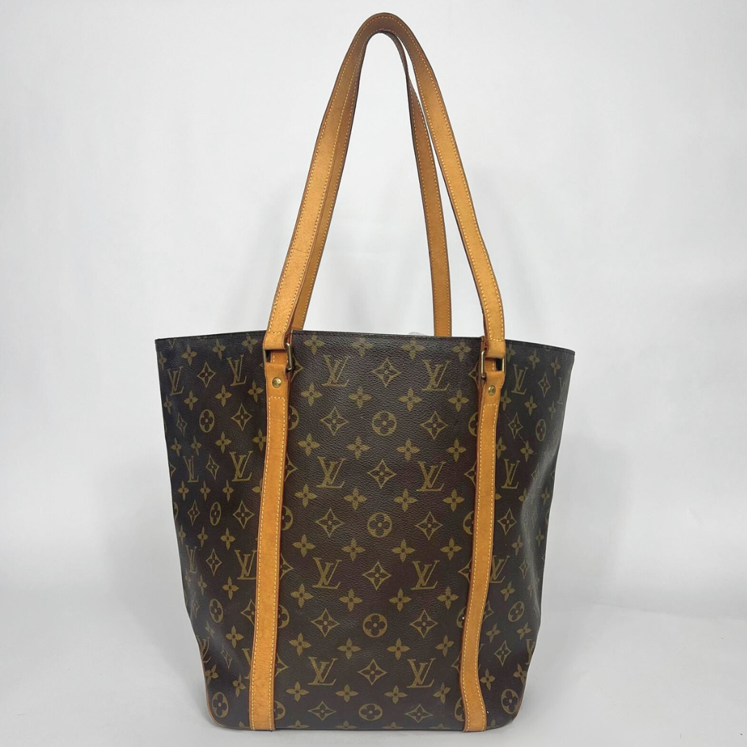 Louis Vuitton Shopper in brown Monogram Canvas on a White Background