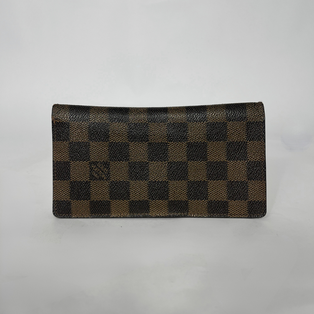 Brown checkered wallet on a white background