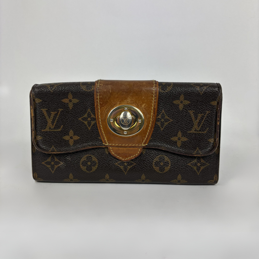Louis Vuitton Wallet in front of white background