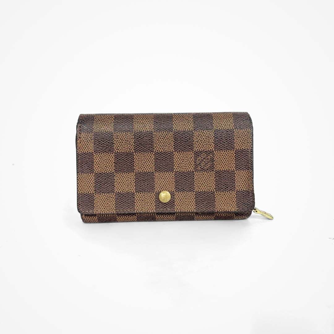 Brown checkered LV wallet with gold accents on a white background