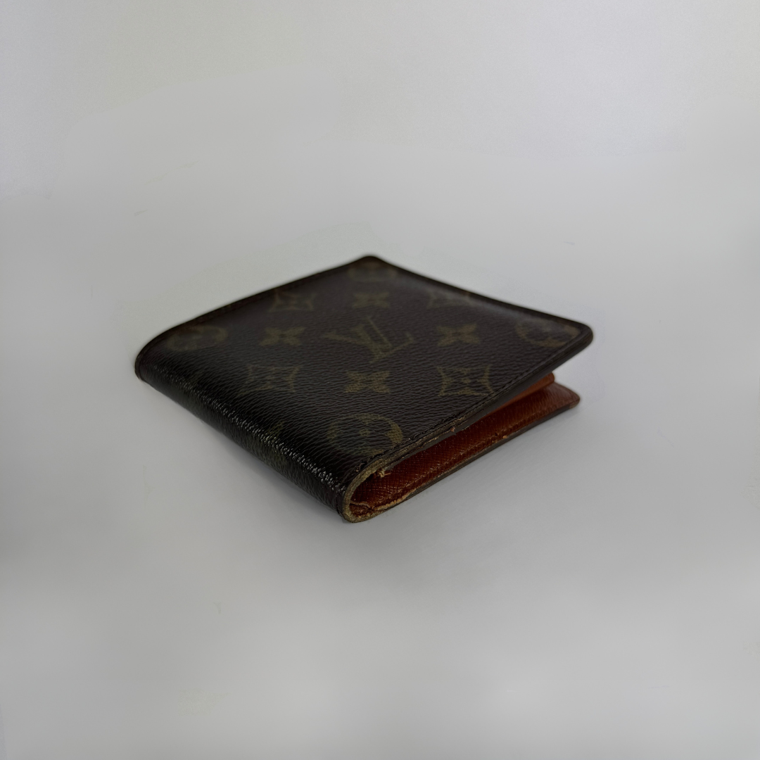 Louis Vuitton Flap Wallet on a white background