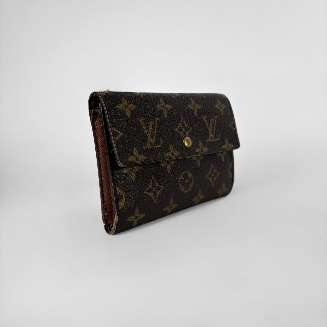 Louis Vuitton International Wallet Medium on a white background