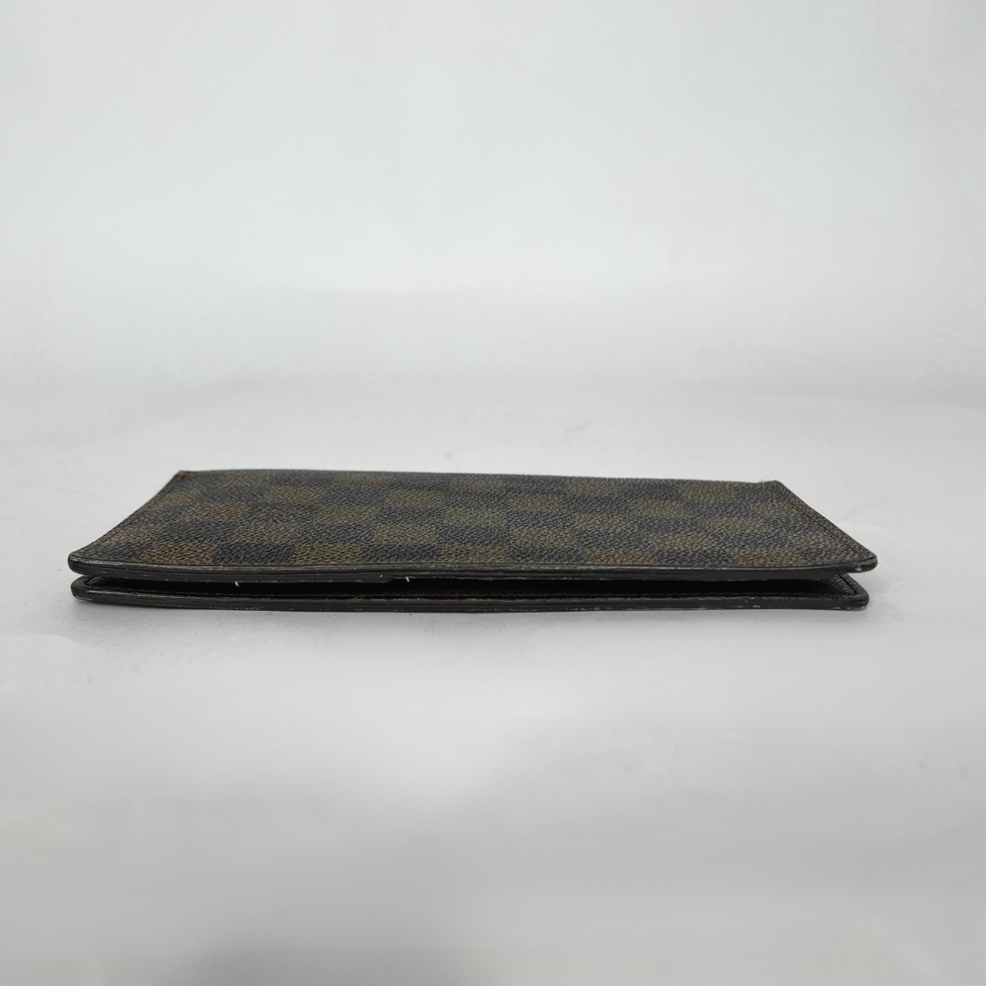 Folded fabric with a checkered pattern on a white background