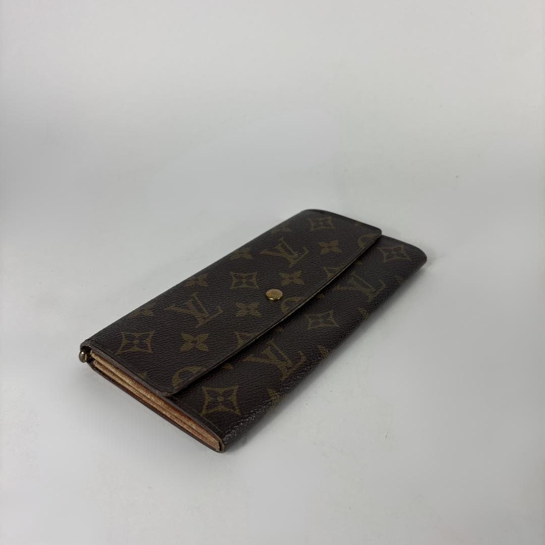 Louis Vuitton wallet on white background