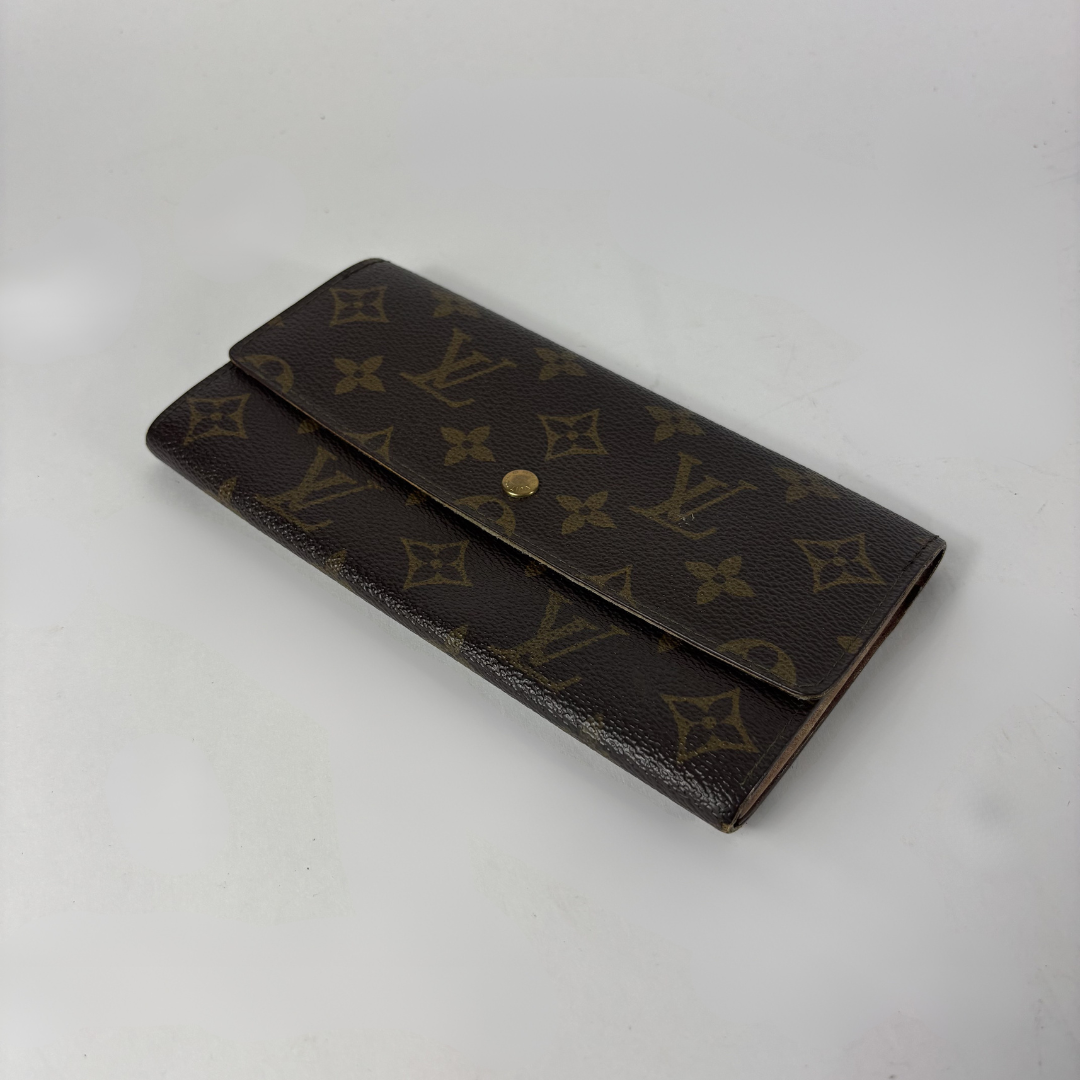 Louis Vuitton wallet on white background
