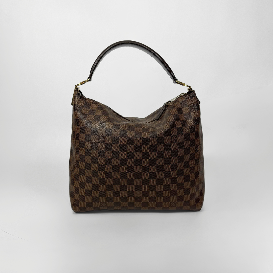 Brown checkered handbag with gold clasp on a white background
