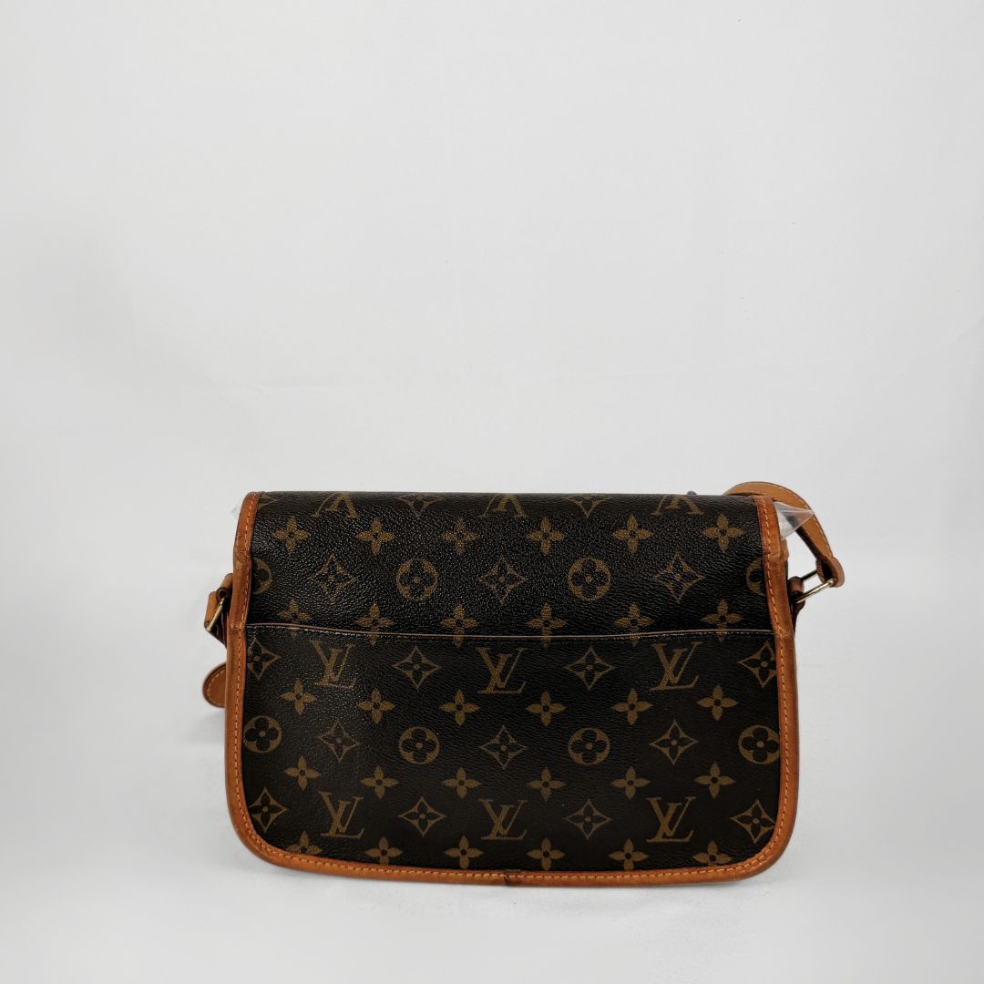 A Louis Vuitton monogram shoulder bag in brown coated canvas with tan leather trim and a matching shoulder strap, photographed against a plain light gray background.
