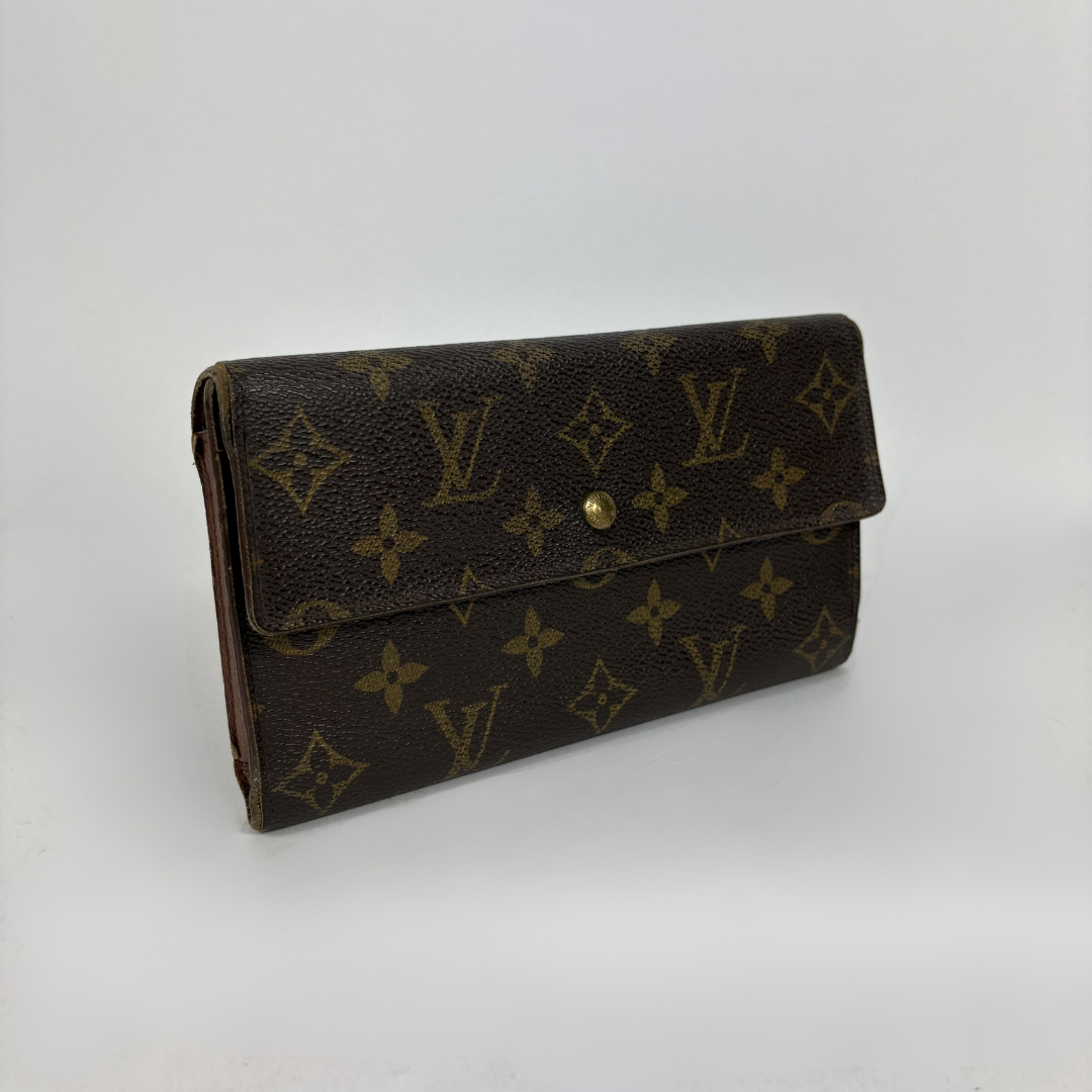 Louis Vuitton wallet on white background
